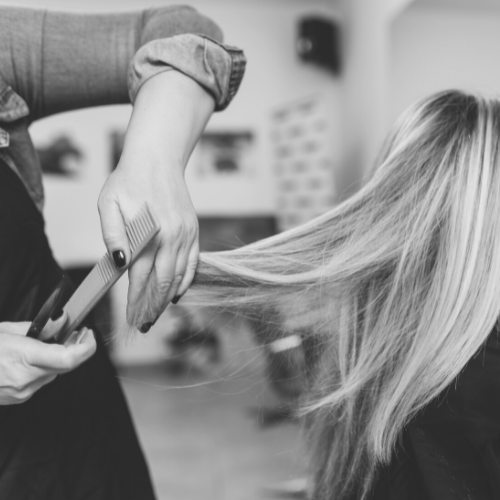 A client at Sunflower Salon receiving the women's haircut service at Sunflower Salon.